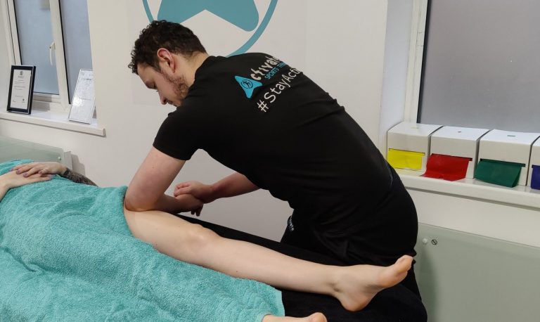 Sports massage for female leg